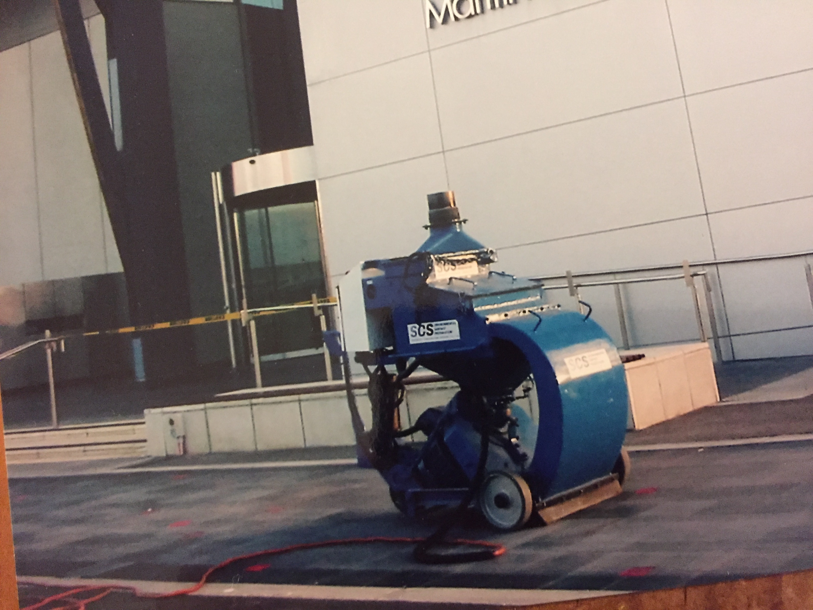 Large warehouse concrete floor with new blue and grey epoxy coating system installed after surface preparation in Perth
